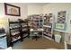 Bright craft room, showcasing ample storage shelves and crafting supplies at 5486 Lipizzan Ln, Plainfield, IN 46168
