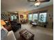 Relaxing living room and dining area that offers lots of natural light at 5486 Lipizzan Ln, Plainfield, IN 46168