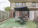 Fenced backyard with patio, umbrella, and privacy offers relaxation and room for outdoor living at 57 Trails End St, Greenwood, IN 46142