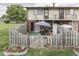 A fenced backyard with outdoor seating and landscaping offers a private retreat at 57 Trails End St, Greenwood, IN 46142