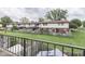 View of a backyard with green space, fencing and potential for outdoor enjoyment from the building's balcony at 57 Trails End St, Greenwood, IN 46142