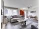 Spacious living room with ample seating and natural light at 57 Trails End St, Greenwood, IN 46142
