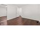 Bright bedroom with hardwood floors and neutral walls at 5843 N Oakland Ave, Indianapolis, IN 46220