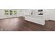Bright kitchen and dining space showcasing an island, fresh paint, and sleek floors at 5843 N Oakland Ave, Indianapolis, IN 46220