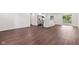 Expansive living space featuring sleek flooring, fresh paint, and an abundance of natural light at 5843 N Oakland Ave, Indianapolis, IN 46220