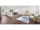 Open-concept living space featuring sleek floors, modern furnishings, and ample natural light at 5843 N Oakland Ave, Indianapolis, IN 46220