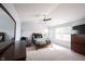 Bright bedroom featuring vaulted ceilings, neutral decor, and a comfortable seating area at 635 Sonoma Ln, Greenfield, IN 46140