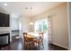 Bright dining area with hardwood floors and a sliding glass door leading to the outside at 635 Sonoma Ln, Greenfield, IN 46140