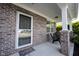 Charming front porch with brick facade and welcoming entrance at 635 Sonoma Ln, Greenfield, IN 46140