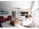 Spacious living room featuring neutral tones, stylish furniture, and a ceiling fan at 635 Sonoma Ln, Greenfield, IN 46140