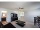Open living room with neutral carpet and views to the staircase and powder room at 635 Sonoma Ln, Greenfield, IN 46140