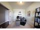 Cozy home office featuring a large desk, storage, and a view of the room's entrance at 635 Sonoma Ln, Greenfield, IN 46140