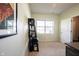 Bright office space showcasing a bookshelf and a window for natural light at 635 Sonoma Ln, Greenfield, IN 46140