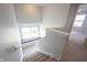 Bright stairwell with a comfortable window seat and natural light at 635 Sonoma Ln, Greenfield, IN 46140