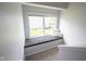Cozy window seat offers natural light and comfortable cushions at 635 Sonoma Ln, Greenfield, IN 46140