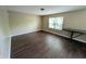Large bedroom with great natural light, a desk, and neutral walls at 6715 Shanghai Cir, Indianapolis, IN 46278