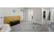 Spacious basement with neutral carpet, providing versatile space for recreation or storage at 6822 Woodford Ln, Indianapolis, IN 46237