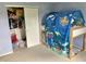 Bedroom featuring an ocean themed play tent and open closet with ample storage space and neutral carpet at 6824 W Philadelphia Dr, McCordsville, IN 46055