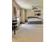 Bright bedroom with a gray bed frame and guitars adorning the wall at 6824 W Philadelphia Dr, McCordsville, IN 46055