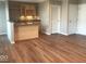 Charming home bar featuring sleek countertops, wine rack, cabinets, mini-fridge, and modern backsplash at 6924 Havenmoor Pl, Indianapolis, IN 46250