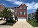 Exterior view of a charming two-story home with a well-kept lawn at 6924 Havenmoor Pl, Indianapolis, IN 46250