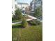 View of the front yard, with decorative trees and lawn at 6924 Havenmoor Pl, Indianapolis, IN 46250