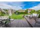 Spacious deck with stylish seating and a lush green yard, perfect for entertaining and enjoying the outdoors at 7320 Corwin Ct, Indianapolis, IN 46259