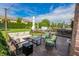 Inviting deck with comfortable seating, outdoor kitchen, and serene backyard views, ideal for entertaining and relaxation at 7320 Corwin Ct, Indianapolis, IN 46259