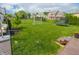 Large backyard featuring a soccer goal, trampoline, and a wooden deck at 7320 Corwin Ct, Indianapolis, IN 46259