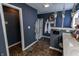 Charming bathroom featuring a walk-in shower, wall decor, and hanging planters, creating a comfortable and stylish space at 7320 Corwin Ct, Indianapolis, IN 46259