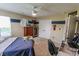 Decorated bedroom with carpet, ceiling fan and wall art at 7320 Corwin Ct, Indianapolis, IN 46259