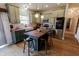 Modern kitchen with custom cabinetry, a butcher block island, and stainless steel appliances at 7320 Corwin Ct, Indianapolis, IN 46259