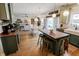Open-concept kitchen and dining area, featuring a butcher block island, and updated appliances provide an inviting space at 7320 Corwin Ct, Indianapolis, IN 46259