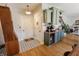 Inviting space with a wet bar featuring a wine fridge and sink, ideal for entertaining or relaxation at 7320 Corwin Ct, Indianapolis, IN 46259