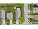 An aerial view shows a well-maintained suburban home with a landscaped yard and a charming tree in the front at 805 Sunvista Dr, Avon, IN 46123