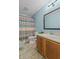 Bathroom featuring single sink vanity and patterned shower curtain at 805 Sunvista Dr, Avon, IN 46123
