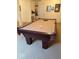 Finished basement features a pool table for entertainment at 8130 Winterset Cir, Indianapolis, IN 46214