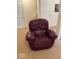 Comfy basement space with recliner and carpeted floors at 8130 Winterset Cir, Indianapolis, IN 46214