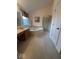 A bathroom with tile floors, soaking tub, glass enclosed shower and natural light at 8130 Winterset Cir, Indianapolis, IN 46214