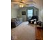 A bonus room with carpet, furniture and a window at 8130 Winterset Cir, Indianapolis, IN 46214