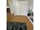 Spacious hallway featuring closet and laminate flooring at 8130 Winterset Cir, Indianapolis, IN 46214