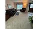 Cozy living room featuring plush carpeting and comfortable seating at 8130 Winterset Cir, Indianapolis, IN 46214