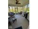 Relaxing screened porch with grill, ideal for outdoor cooking and entertaining at 8130 Winterset Cir, Indianapolis, IN 46214
