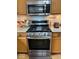 Well-maintained kitchen showcasing a stainless steel stove and oven at 8130 Winterset Cir, Indianapolis, IN 46214