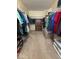Spacious walk-in closet with extensive shelving and storage solutions at 8130 Winterset Cir, Indianapolis, IN 46214