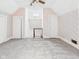 Spacious attic bedroom with dormer windows, sloped ceilings, and classic details at 814 Walnut St, Anderson, IN 46012