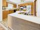 Spacious kitchen featuring wood cabinetry, an island and stainless steel appliances at 814 Walnut St, Anderson, IN 46012