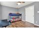 This bedroom has neutral walls, a bunk bed, and a closet at 8904 Browns Valley Ln, Camby, IN 46113