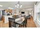 Open dining area with views of the kitchen and living room, perfect for entertaining at 8904 Browns Valley Ln, Camby, IN 46113