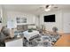 Spacious living room features comfortable seating, stylish decor, and ample natural light at 8904 Browns Valley Ln, Camby, IN 46113